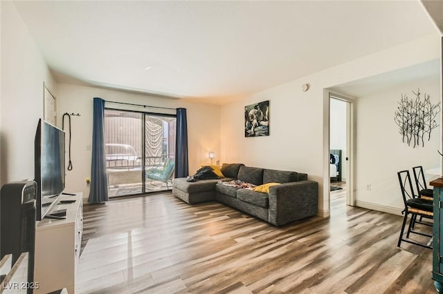 950 Seven Hills Dr Unit 814, Henderson, NV 89052 - living area featuring baseboards and wood finished floors