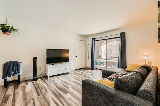 950 Seven Hills Dr Unit 814, Henderson, NV 89052 - living area with baseboards and wood finished floors