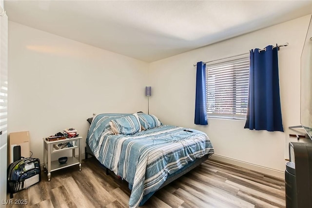 950 Seven Hills Dr Unit 814, Henderson, NV 89052 - bedroom featuring wood finished floors