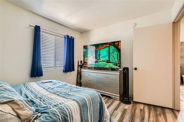 950 Seven Hills Dr Unit 814, Henderson, NV 89052 - bedroom featuring wood finished floors