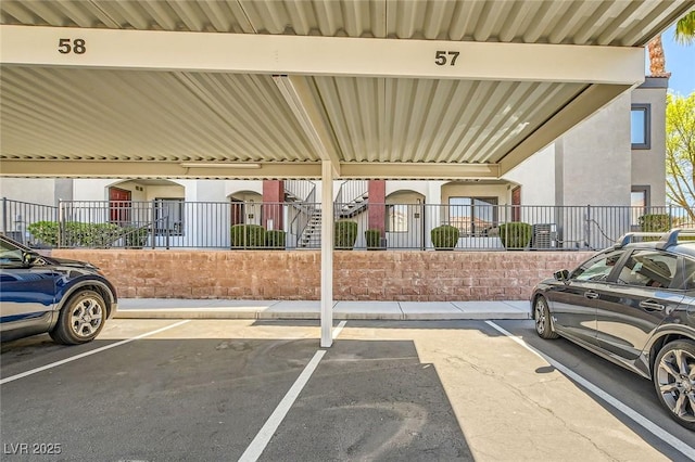 950 Seven Hills Dr Unit 814, Henderson, NV 89052 - covered parking lot featuring fence