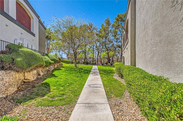 950 Seven Hills Dr Unit 814, Henderson, NV 89052 - view of home's community featuring a lawn and fence
