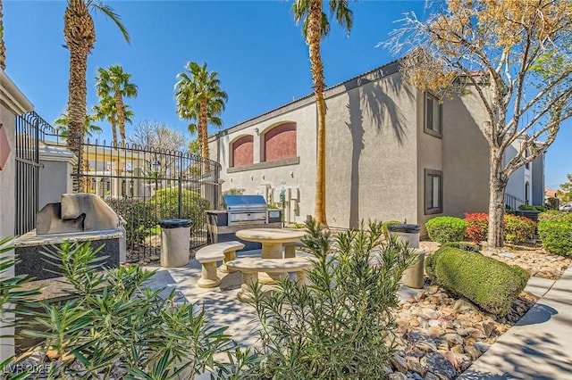 950 Seven Hills Dr Unit 814, Henderson, NV 89052 - view of patio / terrace with area for grilling and fence