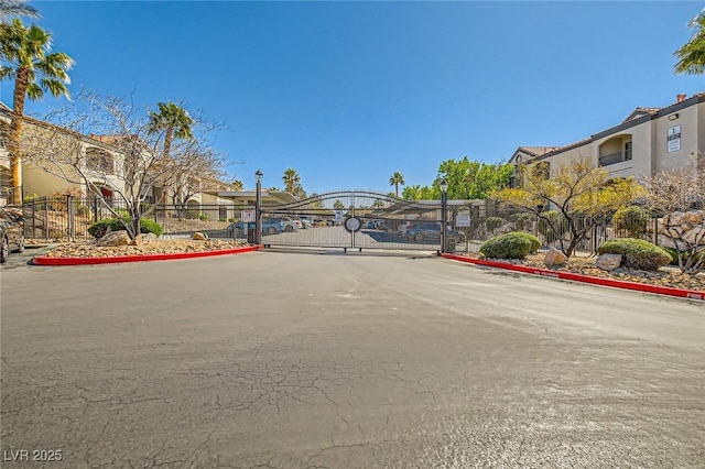 950 Seven Hills Dr Unit 814, Henderson, NV 89052 - view of street with a gate, a gated entry, and curbs