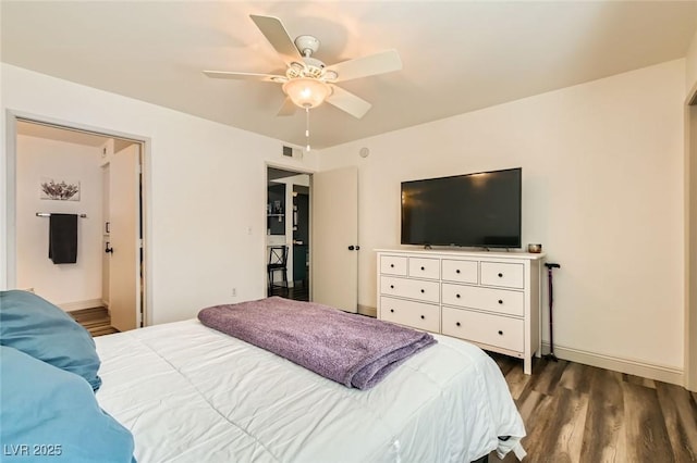 950 Seven Hills Dr Unit 814, Henderson, NV 89052 - bedroom featuring baseboards, visible vents, a ceiling fan, and dark wood finished floors