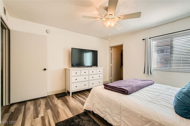 950 Seven Hills Dr Unit 814, Henderson, NV 89052 - bedroom featuring visible vents, ceiling fan, and wood finished floors