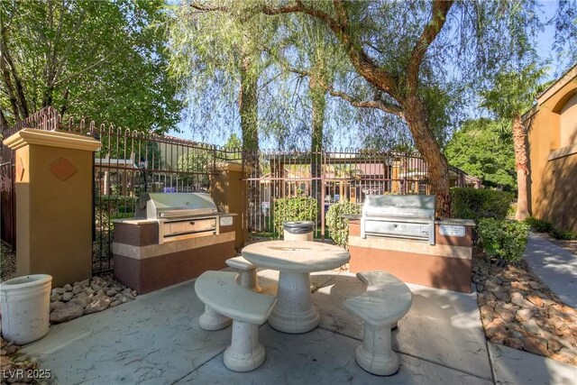 950 Seven Hills Dr Unit 814, Henderson, NV 89052 - view of patio featuring area for grilling and fence