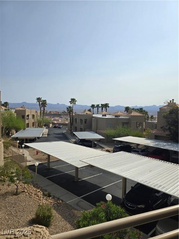 2232 Aspen Mirror Way Unit 204, Laughlin, NV 89029 - exterior view of parking and a mountain view