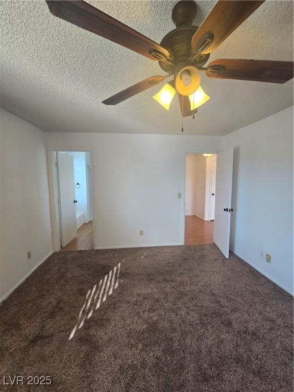 2232 Aspen Mirror Way Unit 204, Laughlin, NV 89029 - carpeted empty room featuring a textured ceiling and a ceiling fan