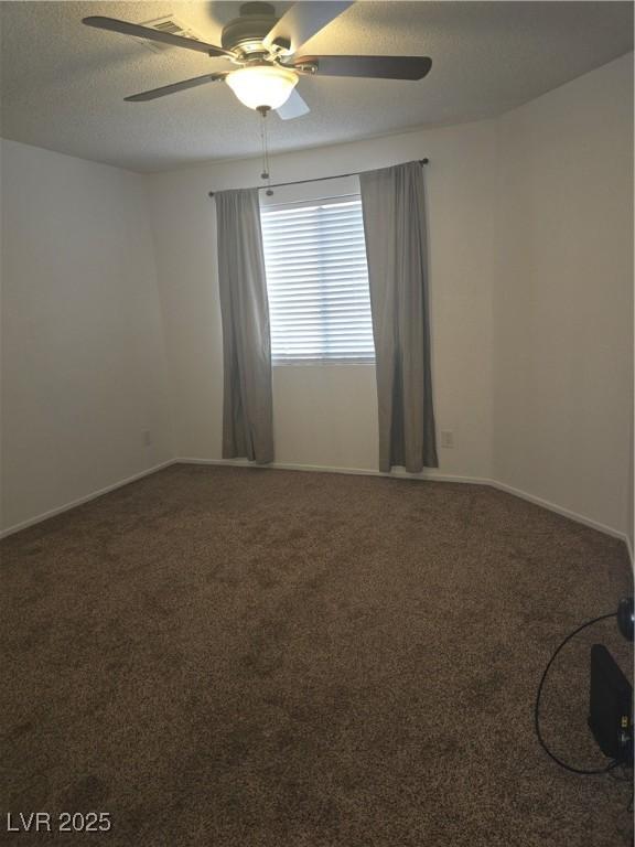 2232 Aspen Mirror Way Unit 204, Laughlin, NV 89029 - empty room featuring ceiling fan, carpet floors, baseboards, and a textured ceiling