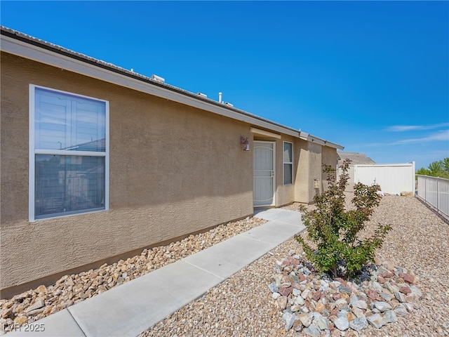 4016 Balsam Mountain St, Las Vegas, NV 89129 - doorway to property with stucco siding