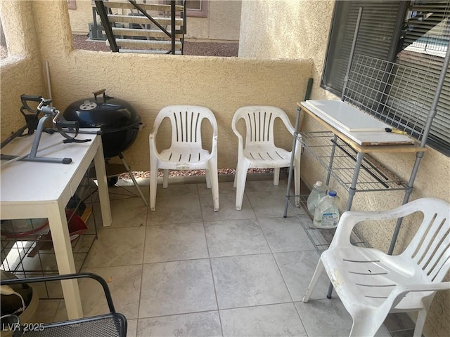 balcony featuring a patio area