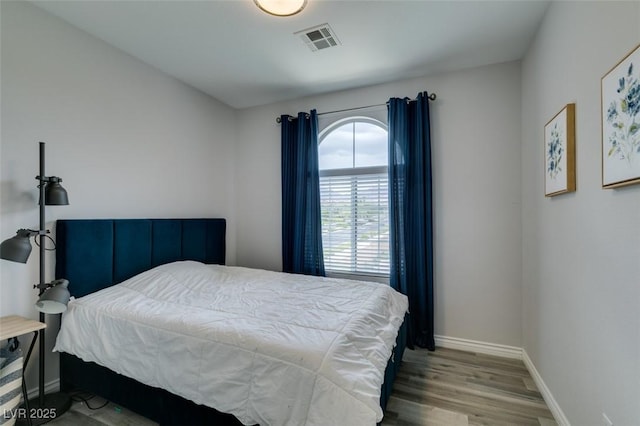 11769 Via Vera Cruz Ct, Las Vegas, NV 89138 - bedroom with wood finished floors and baseboards