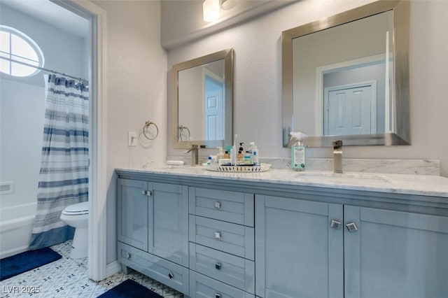 11769 Via Vera Cruz Ct, Las Vegas, NV 89138 - bathroom featuring double vanity, toilet, and a shower with curtain