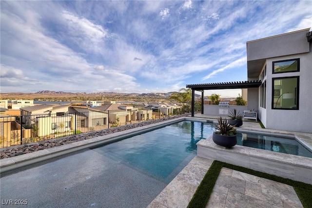 148 Tre Pietre St, Henderson, NV 89011 - view of swimming pool featuring a mountain view, a patio area, fence, a fenced in pool, and a residential view