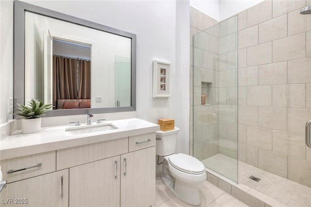 148 Tre Pietre St, Henderson, NV 89011 - full bath featuring toilet, tiled shower, vanity, and tile patterned flooring