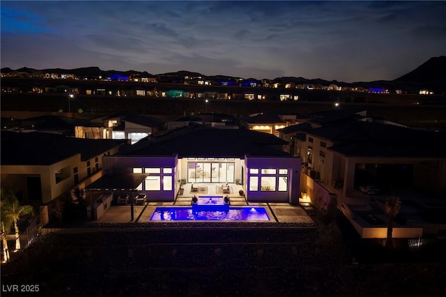 148 Tre Pietre St, Henderson, NV 89011 - rear view of property featuring an outdoor pool and a patio area