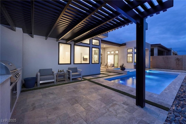 148 Tre Pietre St, Henderson, NV 89011 - view of pool with a patio, an outdoor kitchen, a pergola, a grill, and fence