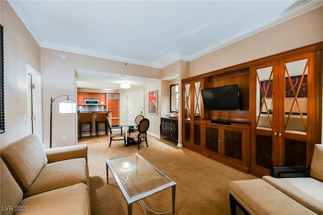 living room featuring crown molding, light colored carpet, and baseboards