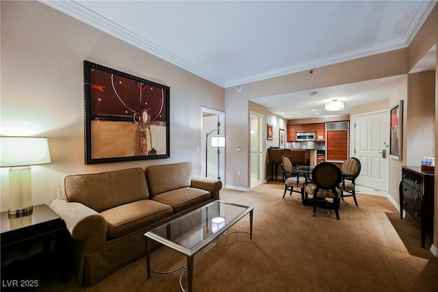 living area featuring ornamental molding, baseboards, and light carpet