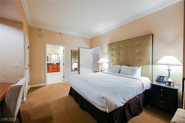 bedroom featuring baseboards, light wood finished floors, wallpapered walls, ornamental molding, and connected bathroom