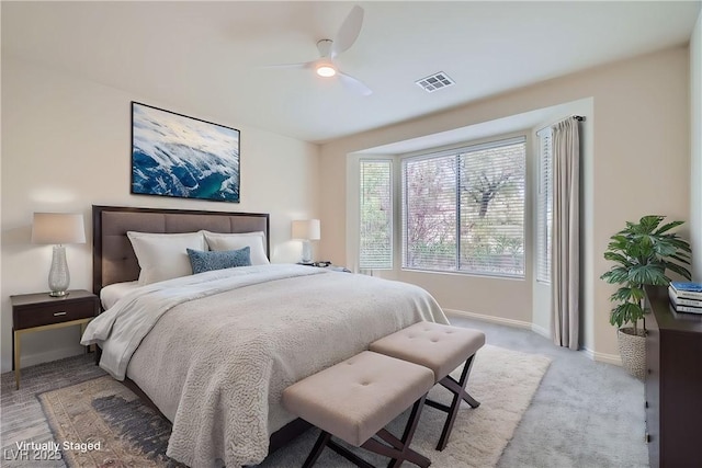 10580 Riva Grande Ct, Las Vegas, NV 89135 - bedroom featuring baseboards, ceiling fan, and light carpet