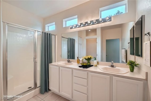 10580 Riva Grande Ct, Las Vegas, NV 89135 - full bathroom with a shower stall, tile patterned flooring, and double vanity
