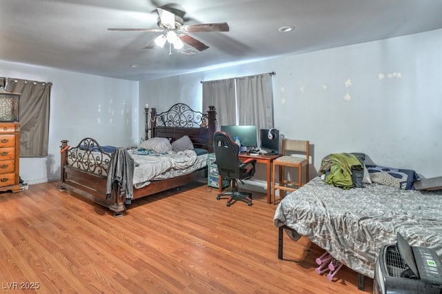 2450 Tournament St, Las Vegas, NV 89142 - bedroom with a ceiling fan and wood finished floors