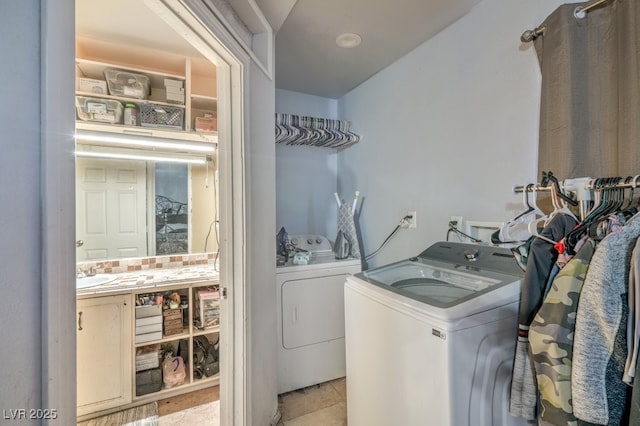 2450 Tournament St, Las Vegas, NV 89142 - laundry area with independent washer and dryer and a sink