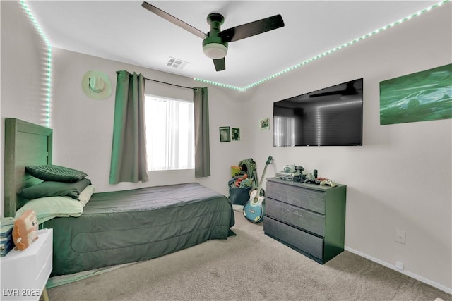 5988 Turtle River Ave, Las Vegas, NV 89156 - carpeted bedroom with baseboards, ceiling fan, and visible vents