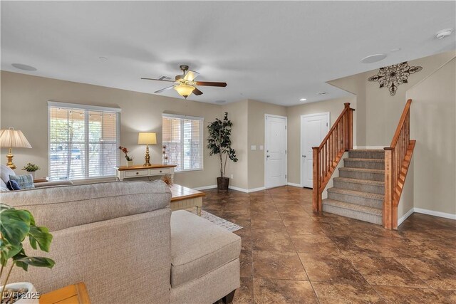 2376 Via Firenze, Henderson, NV 89044 - living area featuring baseboards, stairs, and a ceiling fan