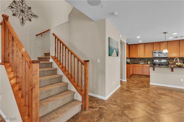 2376 Via Firenze, Henderson, NV 89044 - stairs featuring baseboards and recessed lighting