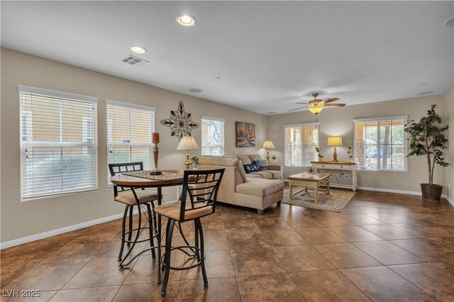 2376 Via Firenze, Henderson, NV 89044 - dining space featuring plenty of natural light, dark tile patterned flooring, baseboards, and recessed lighting