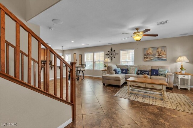 2376 Via Firenze, Henderson, NV 89044 - living area featuring baseboards, stairway, ceiling fan, recessed lighting, and tile patterned flooring