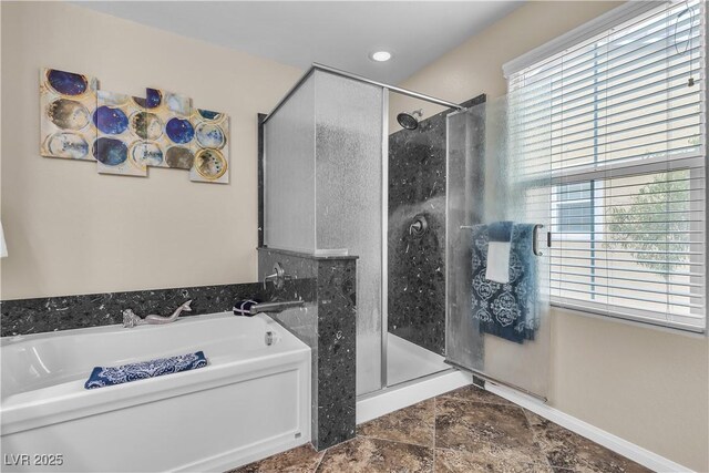 2376 Via Firenze, Henderson, NV 89044 - full bathroom featuring a shower stall, a bath, and baseboards