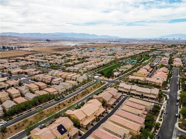 2376 Via Firenze, Henderson, NV 89044 - aerial view of property and surrounding area featuring nearby suburban area and a mountain backdrop