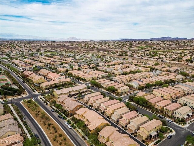2376 Via Firenze, Henderson, NV 89044 - aerial overview of property's location with a mountain backdrop and nearby suburban area
