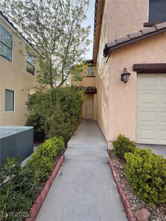 5661 Bonds Flat St, Las Vegas, NV 89148 - property entrance with stucco siding