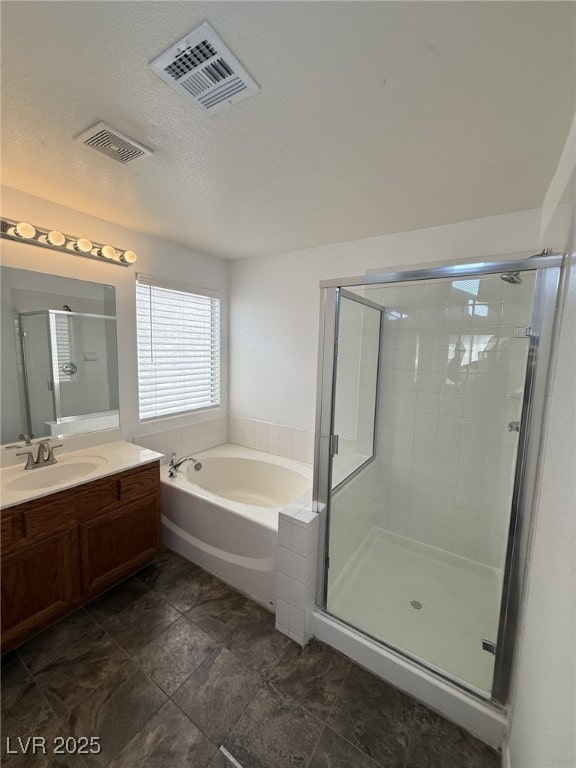 5661 Bonds Flat St, Las Vegas, NV 89148 - full bath with a bath, vanity, and a stall shower