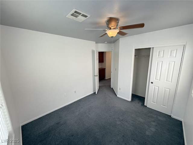 5661 Bonds Flat St, Las Vegas, NV 89148 - unfurnished bedroom featuring dark colored carpet, baseboards, a closet, and ceiling fan