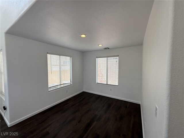 5661 Bonds Flat St, Las Vegas, NV 89148 - unfurnished room with dark wood finished floors, recessed lighting, and baseboards