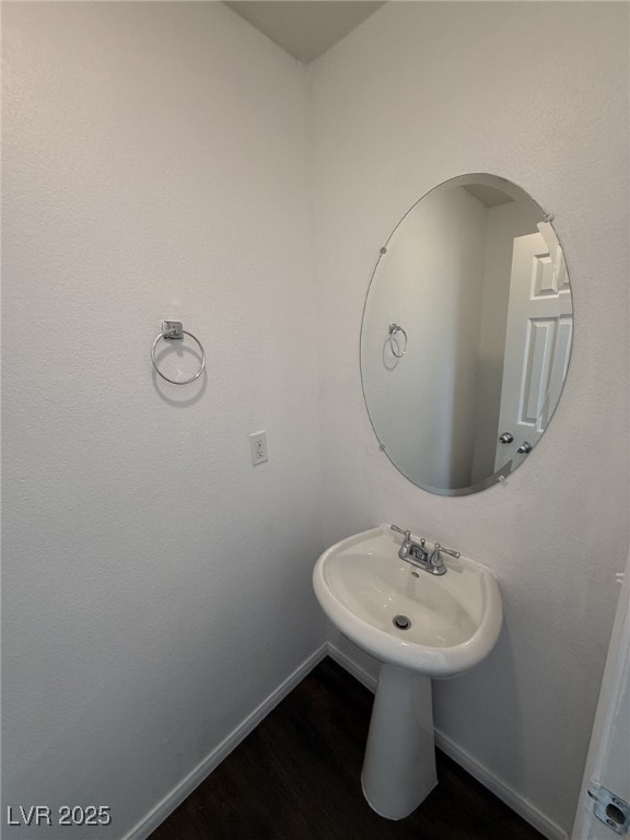 5661 Bonds Flat St, Las Vegas, NV 89148 - bathroom with baseboards and wood finished floors