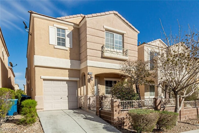 view of front of property featuring stucco siding, concrete driveway, and a garage