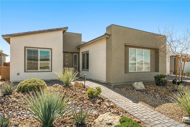 view of front of house featuring stucco siding