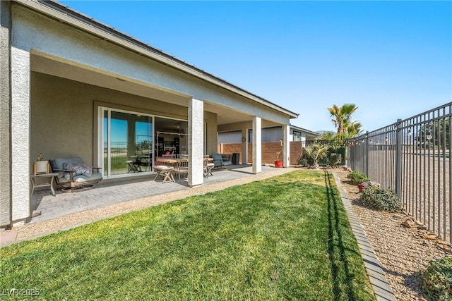 view of yard featuring a patio area and fence