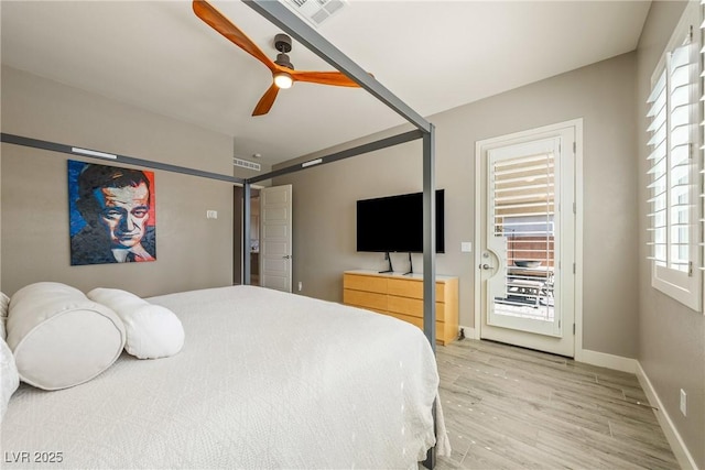 bedroom featuring light wood-type flooring, baseboards, a ceiling fan, visible vents, and access to exterior