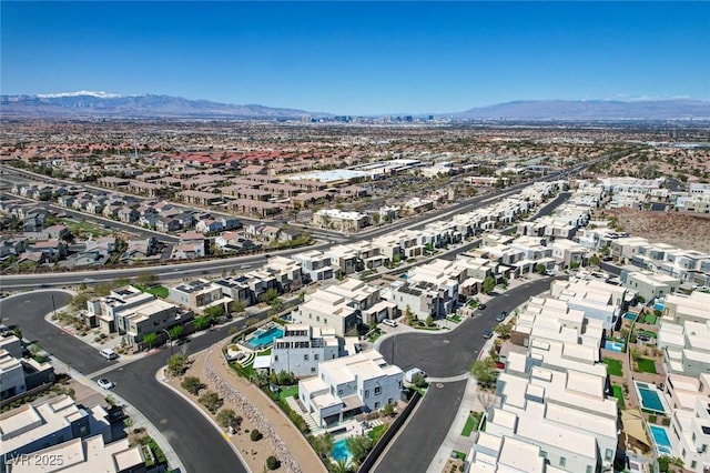 birds eye view of property featuring a residential view and a mountain view