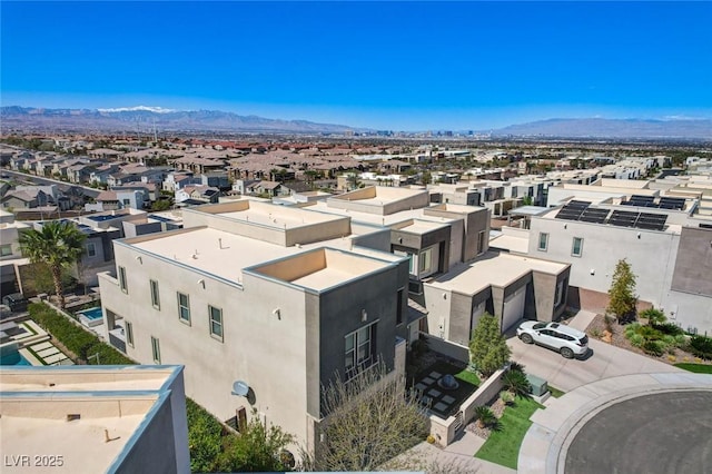 exterior space featuring a residential view and a mountain view