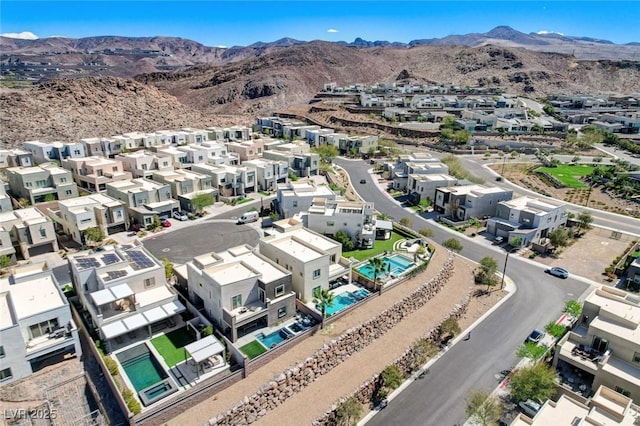 birds eye view of property featuring a residential view and a mountain view