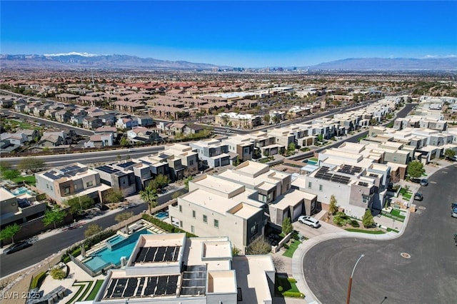aerial view featuring a mountain view and a residential view